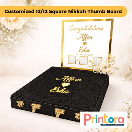 Premium 12x12 square Nikkah thumb impression board with gold frame, customized names, wedding date and matching presentation box for Pakistani weddings.