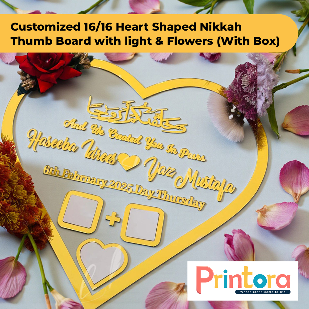 Large 16x16 heart shaped Nikkah thumb impression board with built-in LED light, floral accents, customized names and matching presentation box for Pakistani weddings.